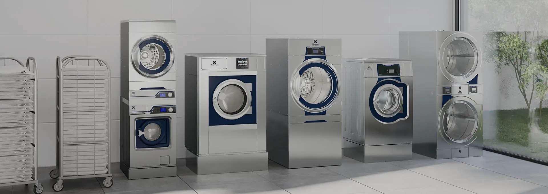 Row of Electrolux Professional Line 6000 washers and tumble dryers in a commercial laundry